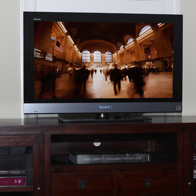 SONY® Bravia® EX 500 32-Inch LCD TV - An impressive centerpiece to any entertainment system! Enjoy full HD 1080p picture quality as smooth motion in fast-action sports scenes, movies, and games. Features Ambient Sensor and LightSensor technologies which automatically adjust color and brightness based on your room’s lighting to ensure you’ll always get the best picture!